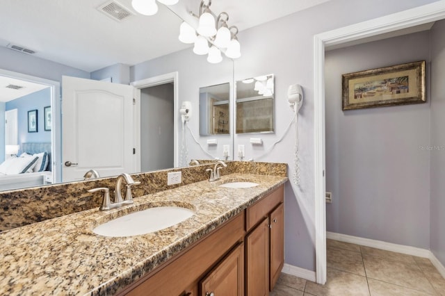 bathroom featuring tile patterned floors and vanity