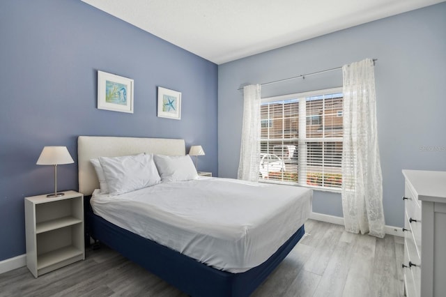 bedroom featuring light hardwood / wood-style flooring