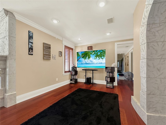 living room featuring wood-type flooring and ornamental molding