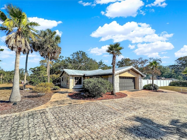 view of property exterior with a garage