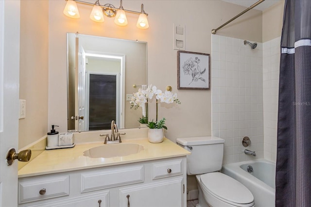 full bathroom with vanity, shower / bath combination with curtain, and toilet