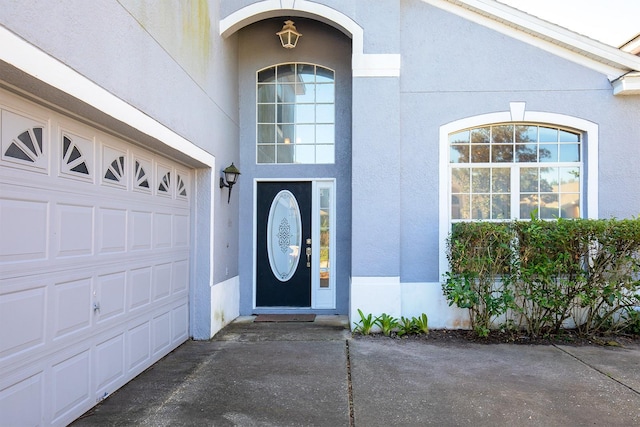 property entrance featuring a garage