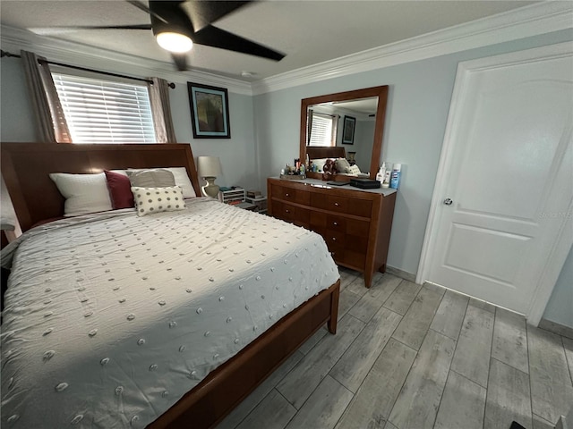 bedroom with ceiling fan, light hardwood / wood-style floors, and crown molding