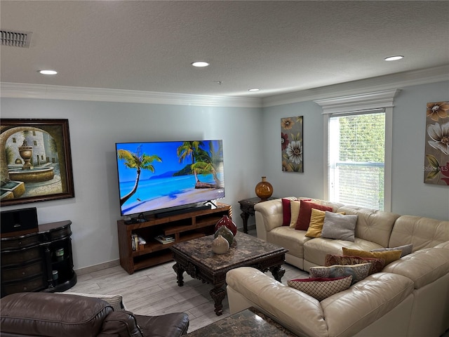 4803 Apple Blossom Ln Unit 4803, Saint Cloud, FL 34771 - living room featuring light wood-style floors, ornamental molding, recessed lighting, a textured ceiling, and baseboards