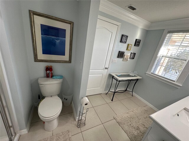 4803 Apple Blossom Ln Unit 4803, Saint Cloud, FL 34771 - bathroom with toilet, vanity, tile patterned flooring, baseboards, and a textured ceiling