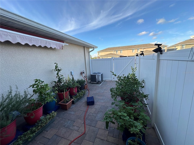 view of patio / terrace with central air condition unit