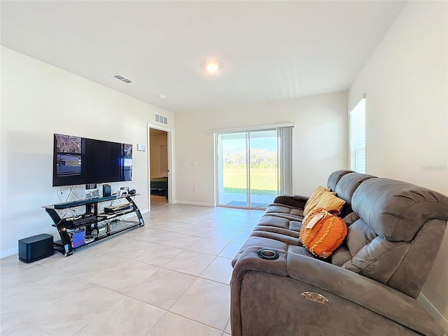 living room with light tile patterned floors