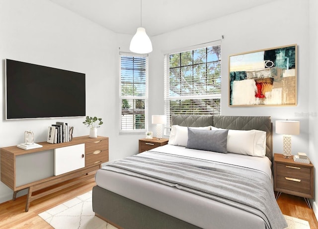 bedroom featuring light wood-type flooring