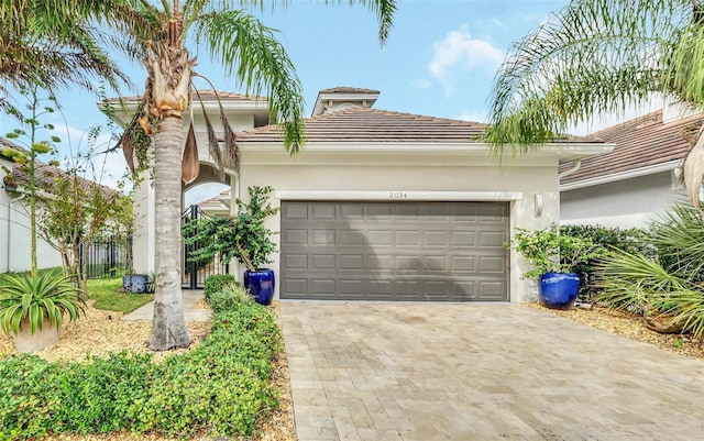 view of front of property featuring a garage