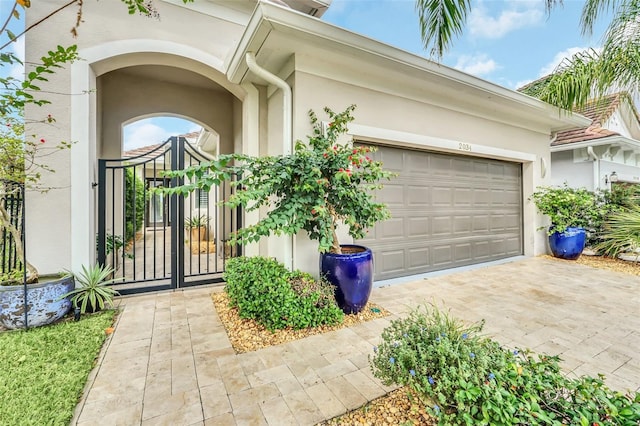 entrance to property featuring a garage