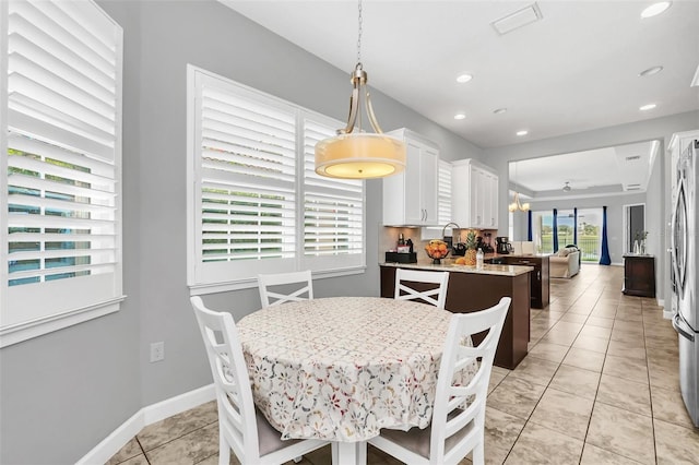 tiled dining space with sink