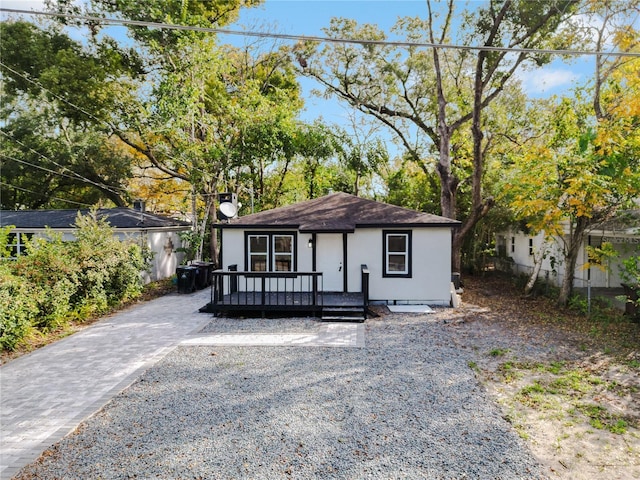 view of front of house with a wooden deck