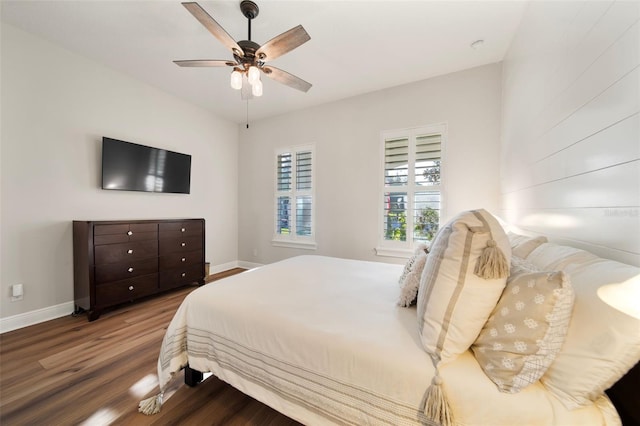 bedroom with hardwood / wood-style flooring and ceiling fan