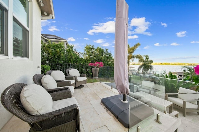 view of patio / terrace with a water view