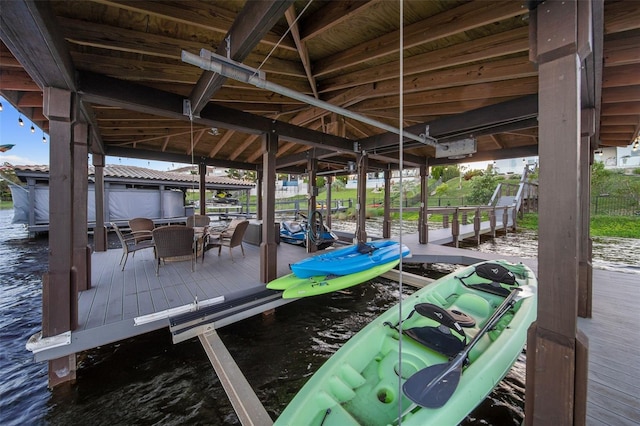 dock area featuring a water view