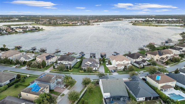 drone / aerial view with a water view