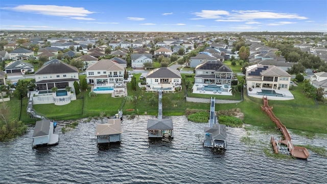 drone / aerial view with a water view