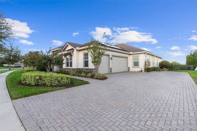 view of front of home with a garage