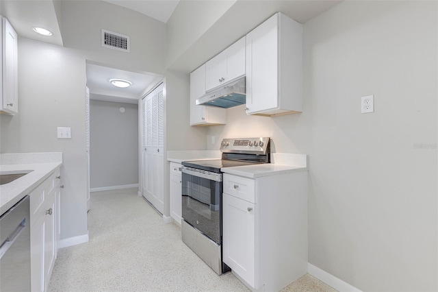 kitchen with white cabinets and appliances with stainless steel finishes