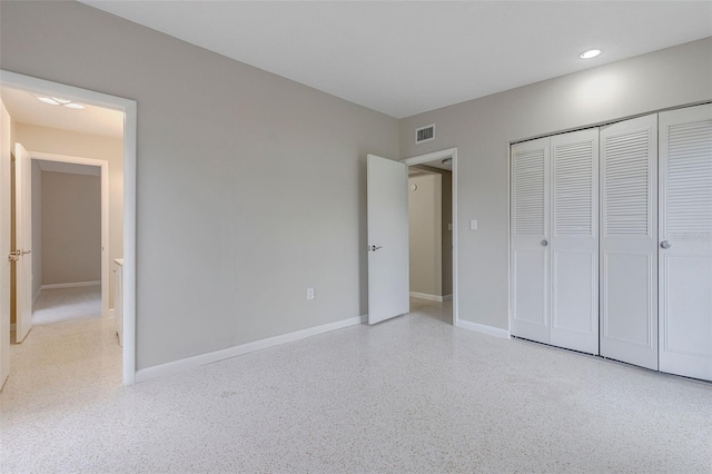 unfurnished bedroom with a closet