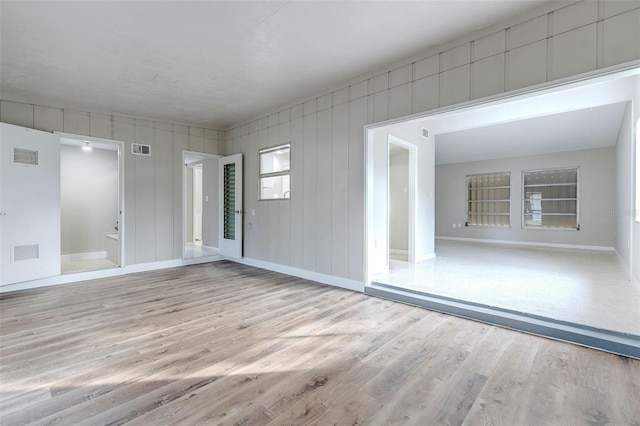 empty room featuring light hardwood / wood-style floors