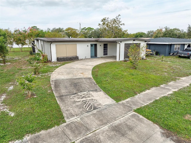 ranch-style house featuring a front yard