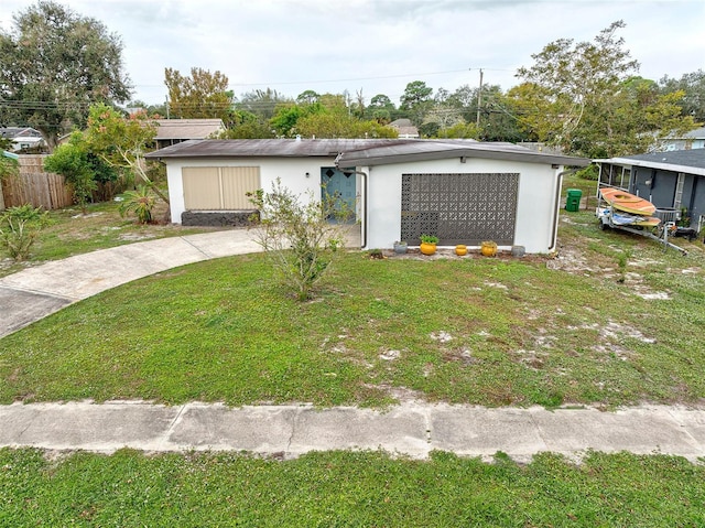 view of front of home with a front lawn