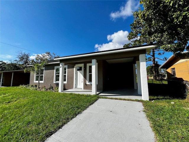 view of front of property with a front lawn and a porch