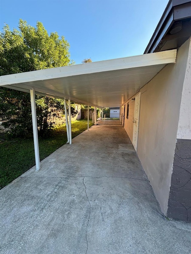 view of parking featuring a carport