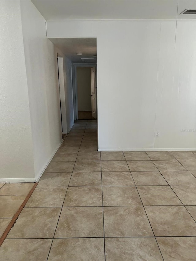 hall featuring tile patterned floors