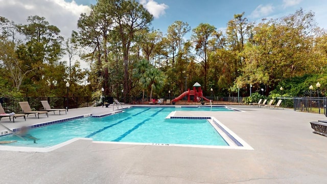 view of swimming pool featuring a patio