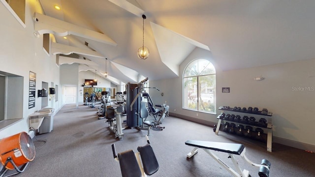 workout area with vaulted ceiling