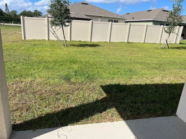 view of yard featuring fence