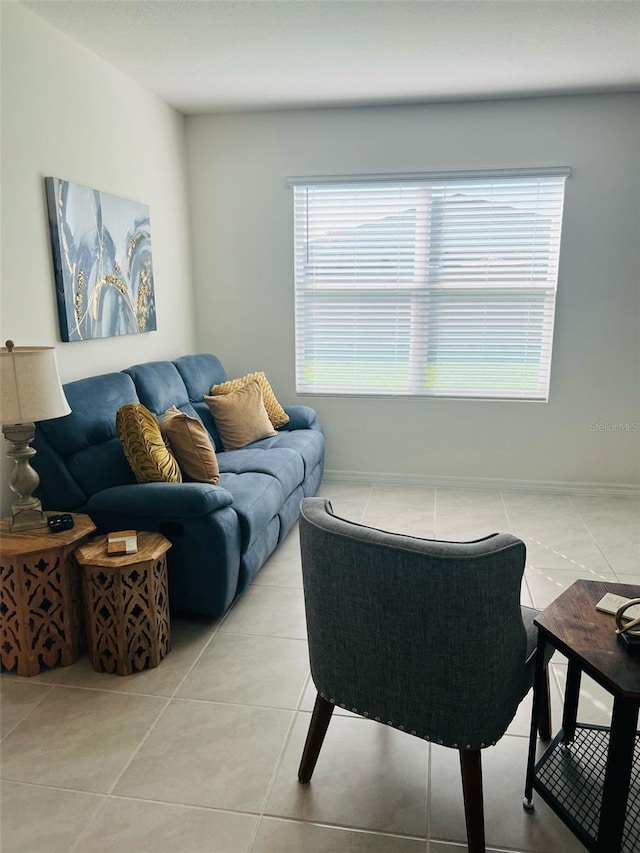 living room with light tile patterned flooring