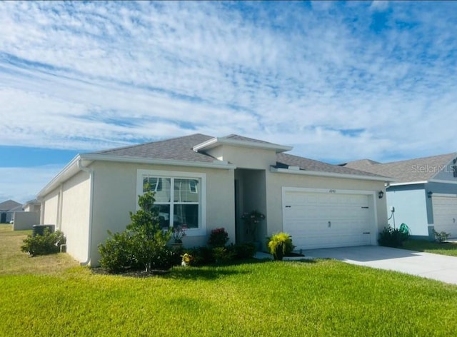 ranch-style house with a front lawn, an attached garage, driveway, and stucco siding