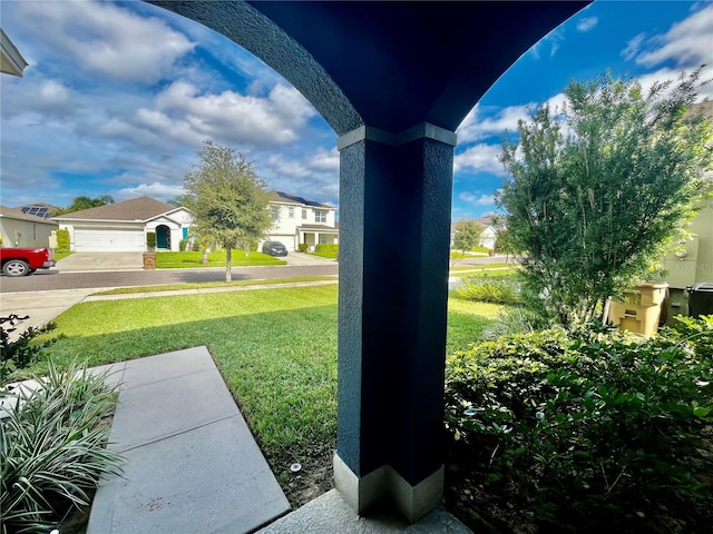 view of yard with a garage