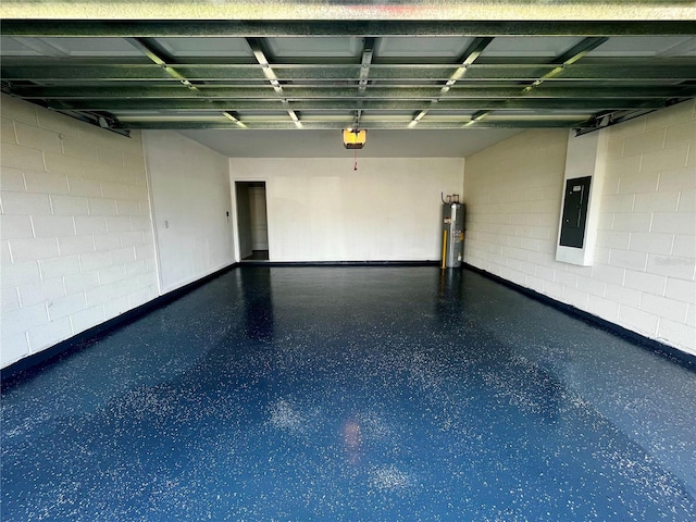 garage featuring electric panel, electric water heater, and a garage door opener