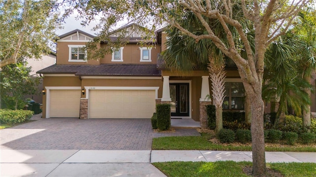 craftsman inspired home with a garage