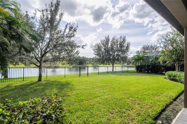 view of yard with a water view