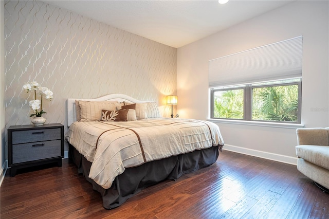 bedroom featuring dark wood-type flooring