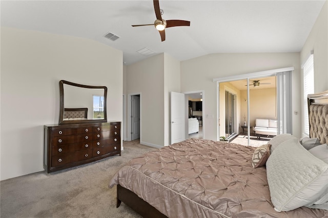 carpeted bedroom with ceiling fan, vaulted ceiling, and multiple windows