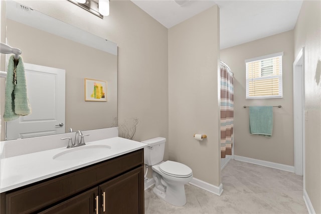 bathroom featuring a shower with curtain, vanity, and toilet