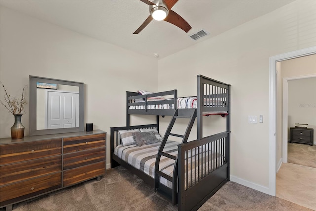 carpeted bedroom with ceiling fan