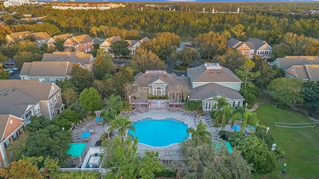 12843 Madison Pointe Cir Unit 107, Orlando, FL 32821 - aerial perspective of suburban area with a forest