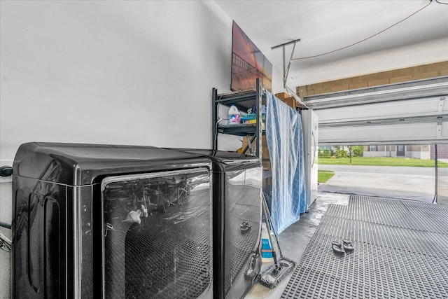 interior space with washer and clothes dryer