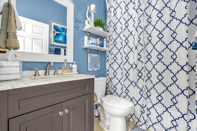 bathroom featuring tile patterned flooring, vanity, toilet, and a shower with shower curtain