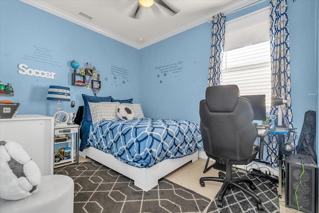 bedroom with ceiling fan and crown molding