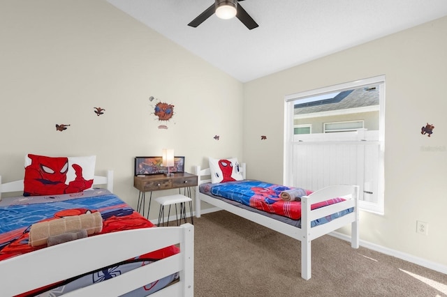 bedroom with ceiling fan, carpet, and vaulted ceiling