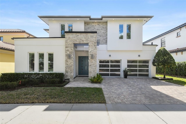 view of front of property with a garage