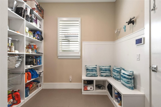 mudroom with light tile patterned flooring